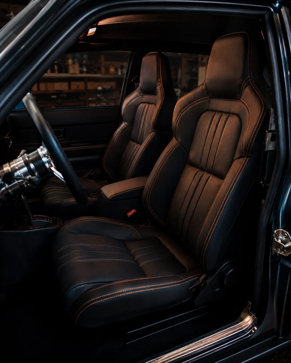 Installed custom car interior with hand-stitched seats